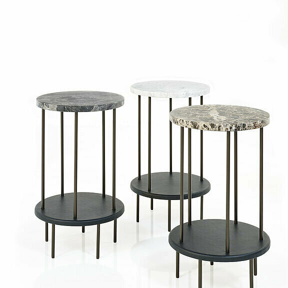 DD Table side tables with bronze powder coated struts, marble table top and leather covered base plate