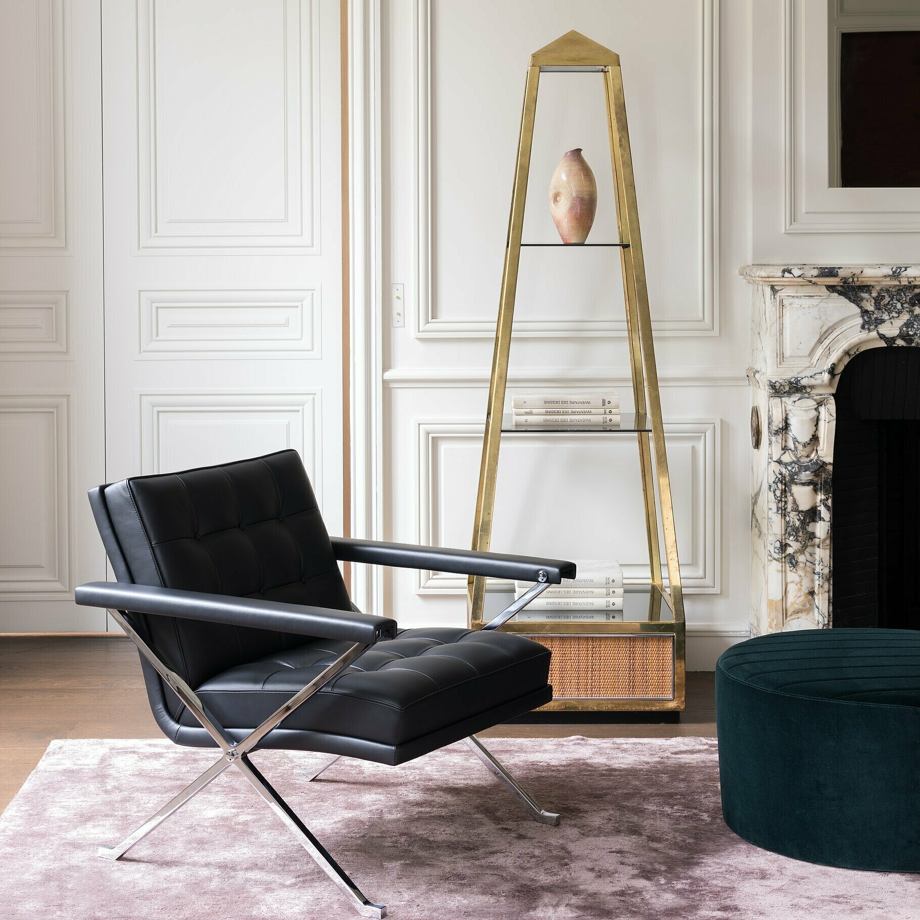 classic Constanze armchair in black leather and shiny chrome frame