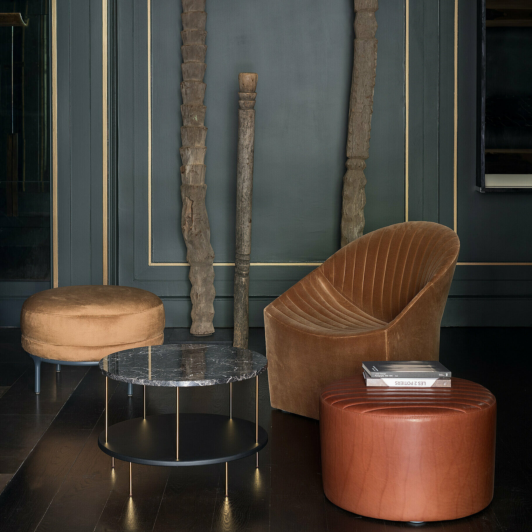Oyster Fauteuil in brown velvet with Oyster stool  in brown leather, Vuelta stool and DD table