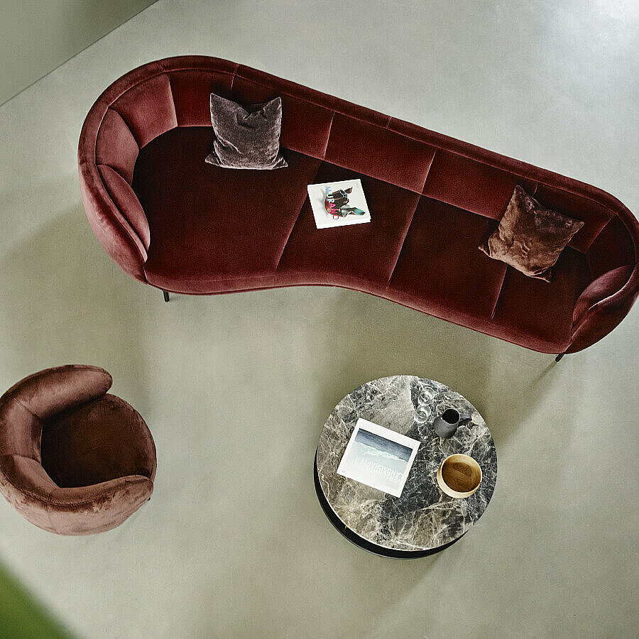 Vuelta lounge sofa 298 cm width covered in burgundy velvet, photographed from above