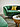 Eckdetail eines Vuelta Lounge Island Sofas mit grünem Samt bezogen