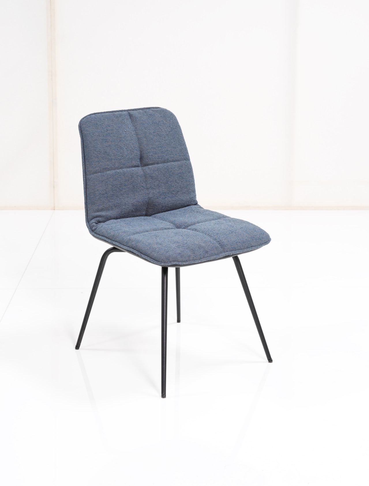 Shilo chair in blue fabric and black four leg base